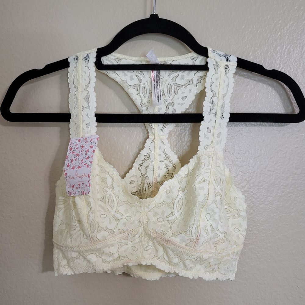 FREE PEOPLE Yellow lace racer-back bralette.